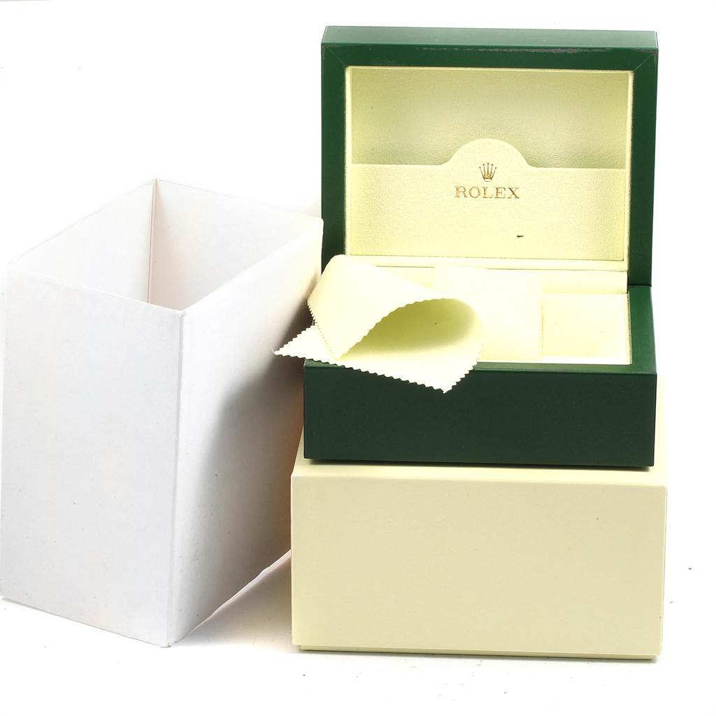 The image shows the packaging and a cleaning cloth for a Rolex Turn-o-Graph 116264 Men
s Stainless Steel White Dial 116264 Men
s Stainless Steel White Dial watch.