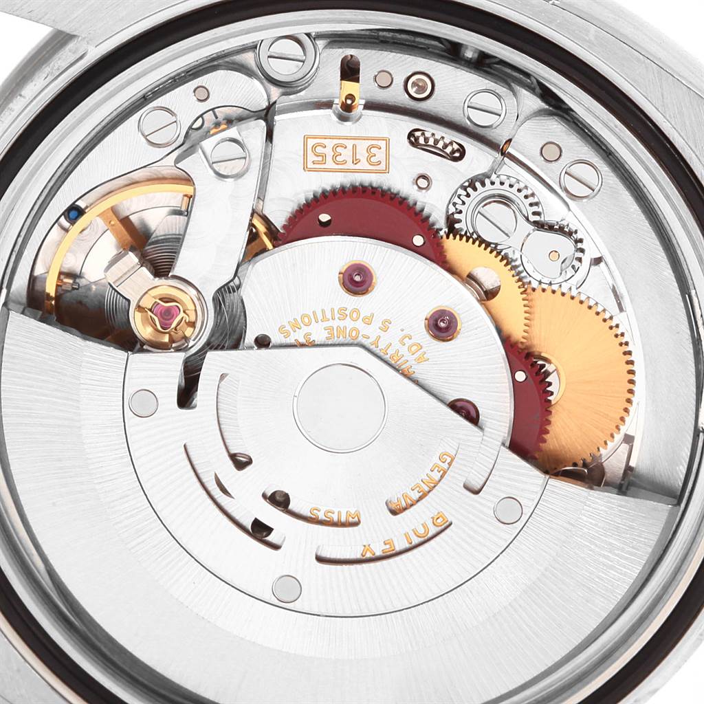 This close-up image shows the intricate internal mechanism of the Rolex Turn-o-Graph 116264 Men
s Stainless Steel White Dial 116264 Men
s Stainless Steel White Dial watch, highlighting gears and components.