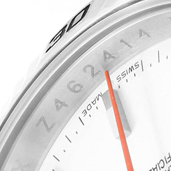 This close-up image of a Rolex Turn-o-Graph 116264 Men
s Stainless Steel White Dial 116264 Men
s Stainless Steel White Dial model shows part of the dial, bezel, and the orange seconds hand.