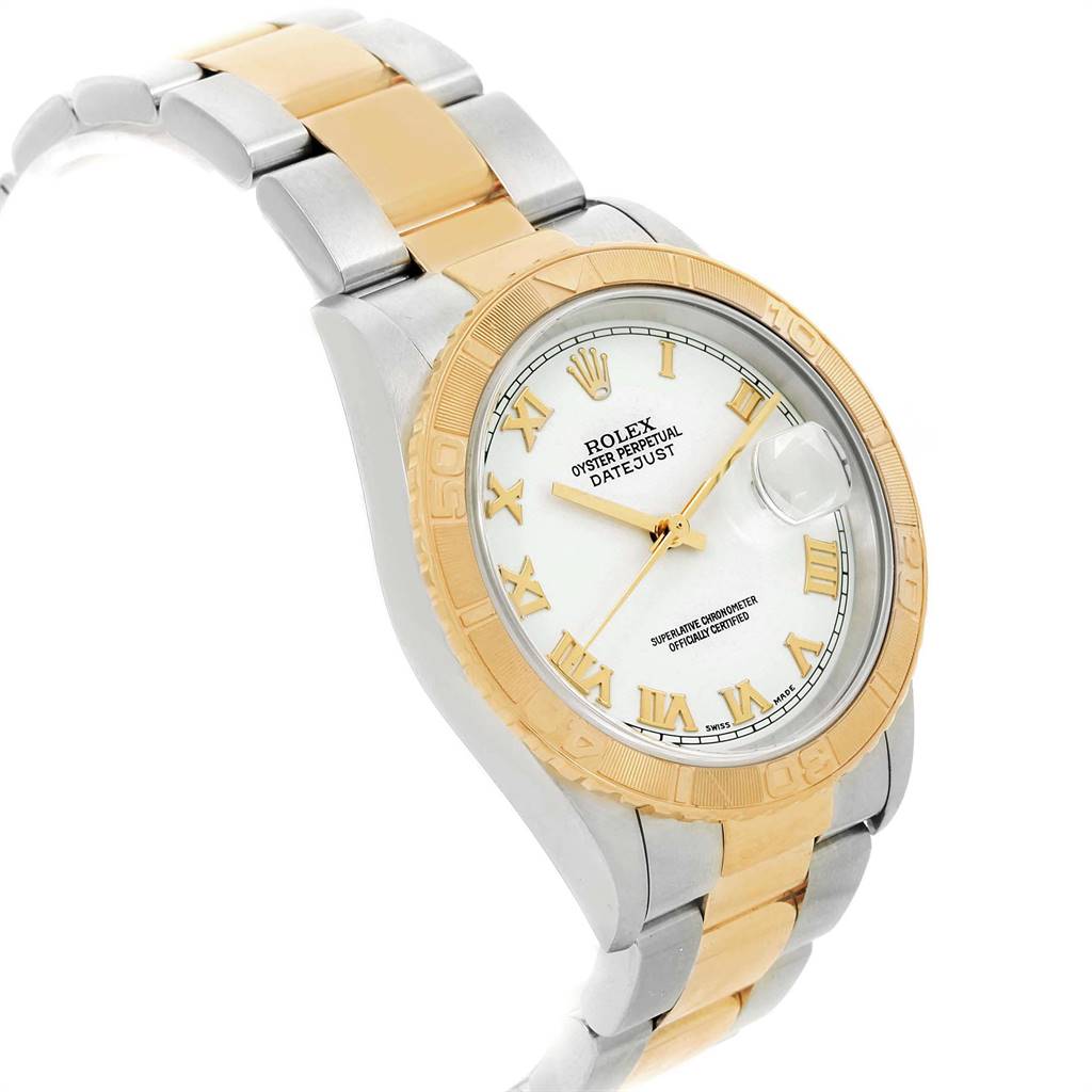 This image shows a Rolex Turn-o-Graph 16263 Men
s Steel and Gold (two tone) White Dial 16263 Men
s Steel and Gold (two tone) White Dial Datejust watch angled slightly from the side, highlighting its two-tone bracelet and bezel.