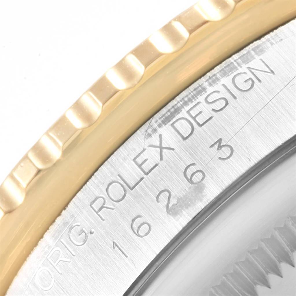 This image shows a close-up of the bezel and part of the case back of a Rolex Turn-o-Graph 16263 Men
s Steel and Gold (two tone) White Dial 16263 Men
s Steel and Gold (two tone) White Dial watch.