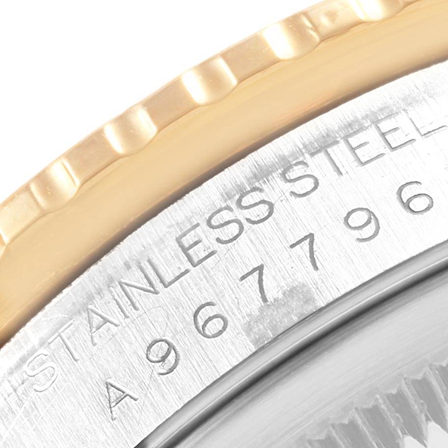 This image shows a close-up of the bezel and part of the case back of a Rolex Turn-o-Graph 16263 Men
s Steel and Gold (two tone) White Dial 16263 Men
s Steel and Gold (two tone) White Dial watch.