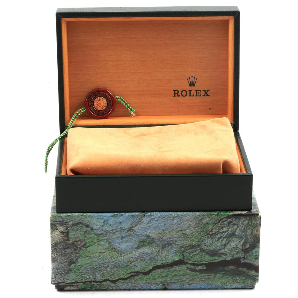 The image shows an open Rolex watch box for a Turn-o-Graph model, containing a tag and cushion but no watch visible.