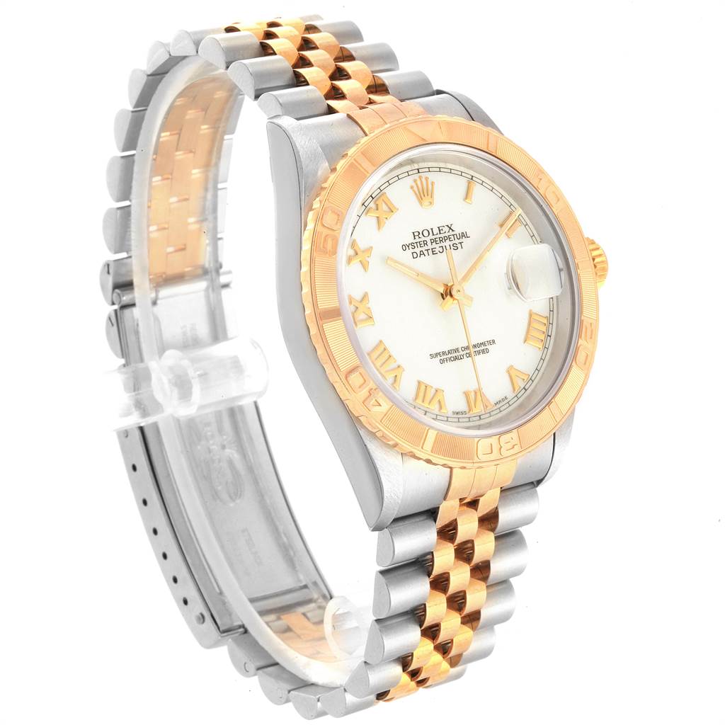 The Rolex Turn-o-Graph 16263 Men
s Steel and Gold (two tone) White Dial 16263 Men
s Steel and Gold (two tone) White Dial watch is shown from an angled side view, highlighting its two-tone band, bezel, and dial.