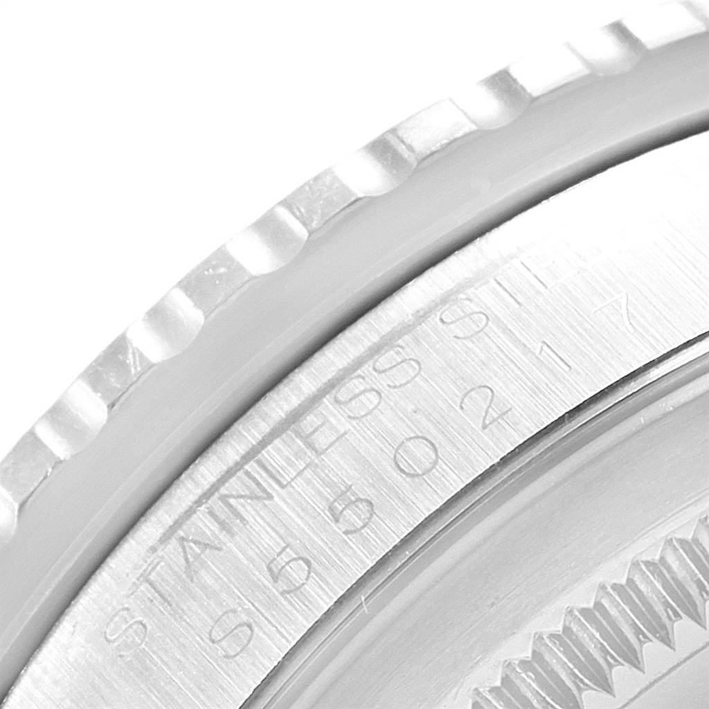 This close-up image of the Rolex Turn-o-Graph 16264 Men
s Stainless Steel White Dial 16264 Men
s Stainless Steel White Dial watch shows the stainless steel bezel and detailed engravings.