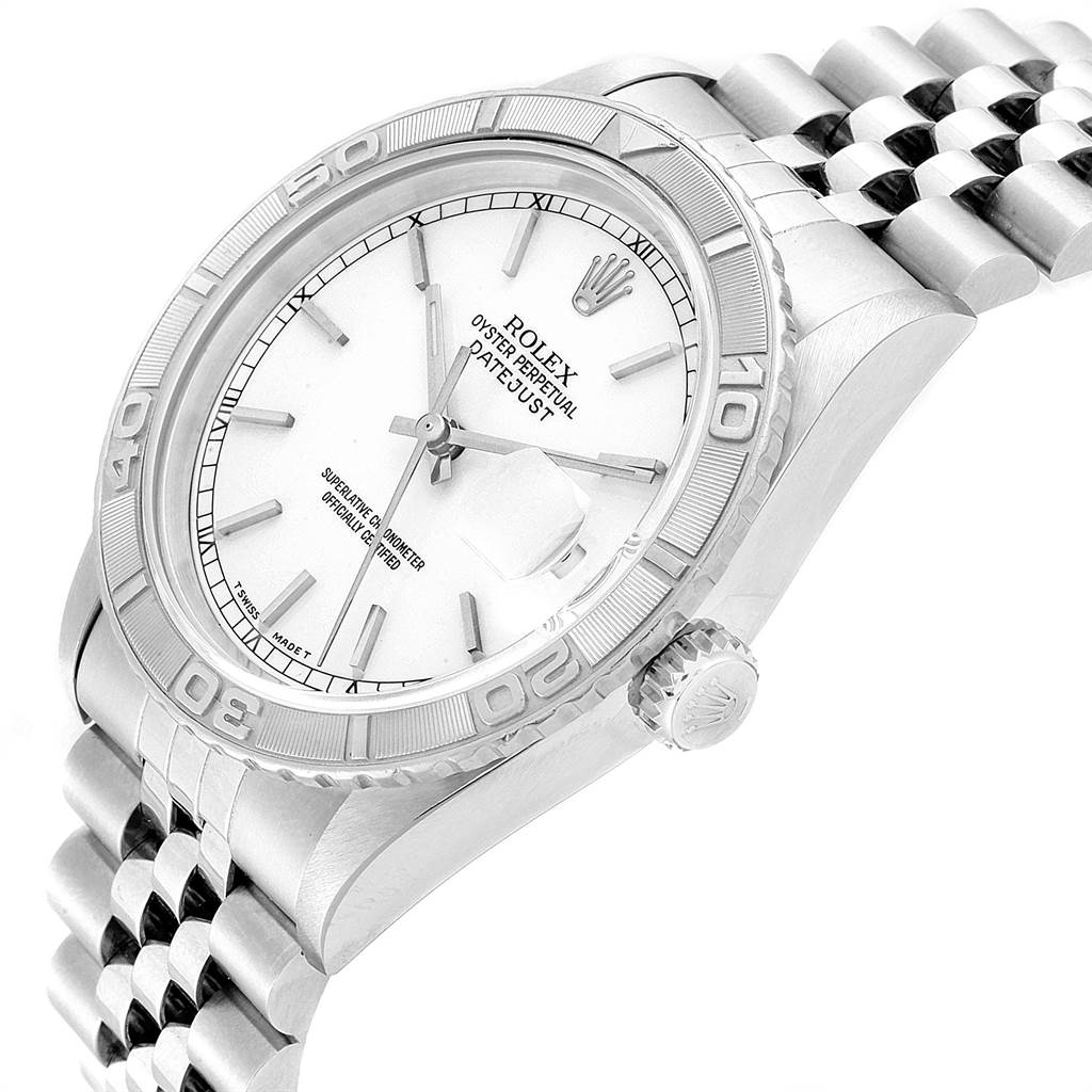 The image shows a Rolex Turn-o-Graph 16264 Men
s Stainless Steel White Dial 16264 Men
s Stainless Steel White Dial Oyster Perpetual Datejust watch at an angled close-up, featuring its face, bezel, and bracelet.