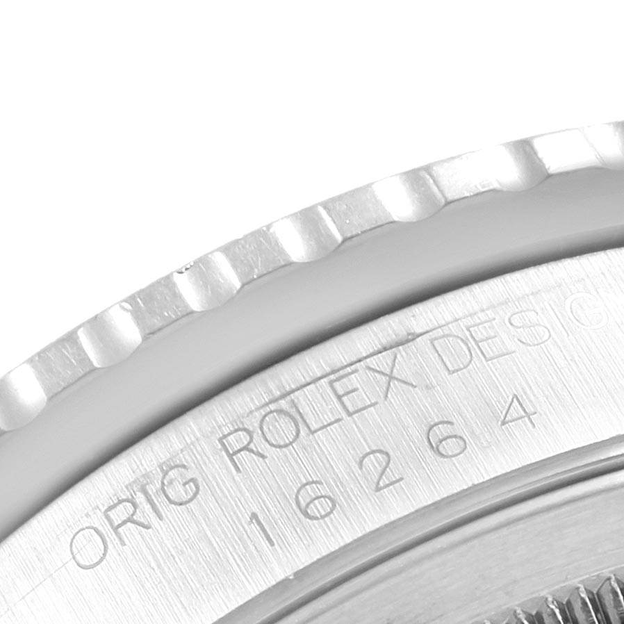 This image shows a close-up of the case back and the fluted edge of the bezel on a Rolex Turn-o-Graph 16264 Men
s Stainless Steel White Dial 16264 Men
s Stainless Steel White Dial model.