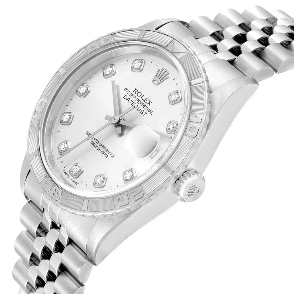 The image shows a close-up angle of the Rolex Turn-o-Graph 16264 Men
s Stainless Steel Silver Dial 16264 Men
s Stainless Steel Silver Dial watch, showing the face, bezel, crown, and a portion of the bracelet.