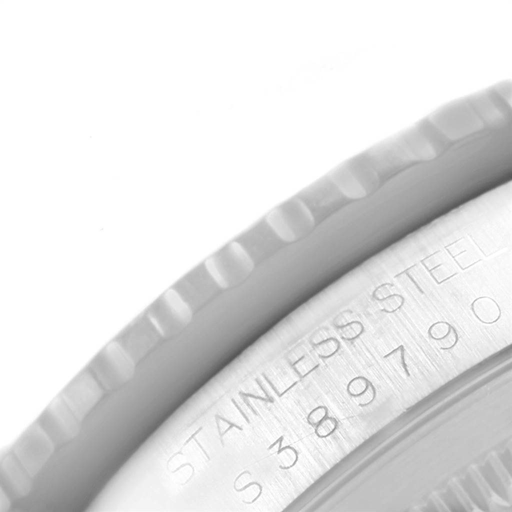 This image shows a close-up of the stainless steel case and bezel of a Rolex Turn-o-Graph 16264 Men
s Stainless Steel Black Dial 16264 Men
s Stainless Steel Black Dial watch.