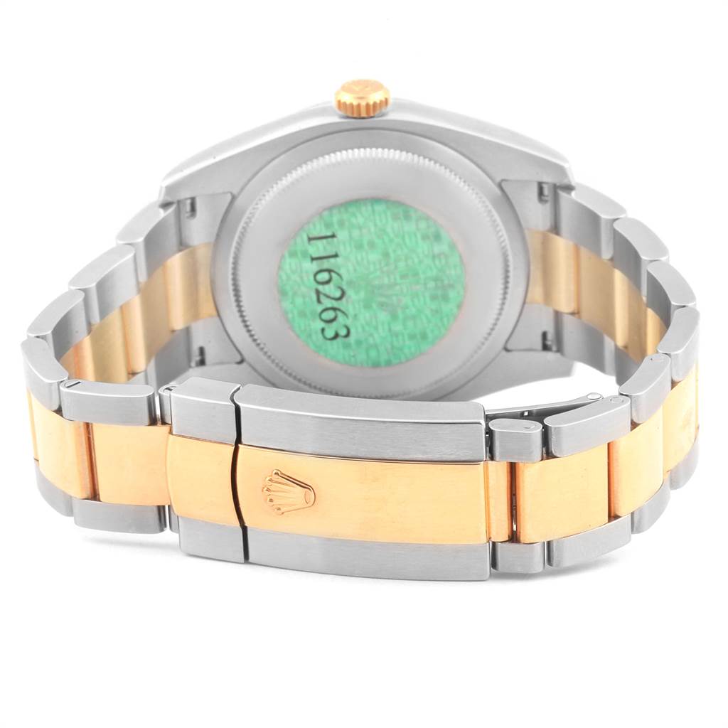 The image shows the back case and the two-tone bracelet of a Rolex Turn-o-Graph 116263 Men
s Steel and Gold (two tone) White Dial 116263 Men
s Steel and Gold (two tone) White Dial watch, viewed from a rear angle.