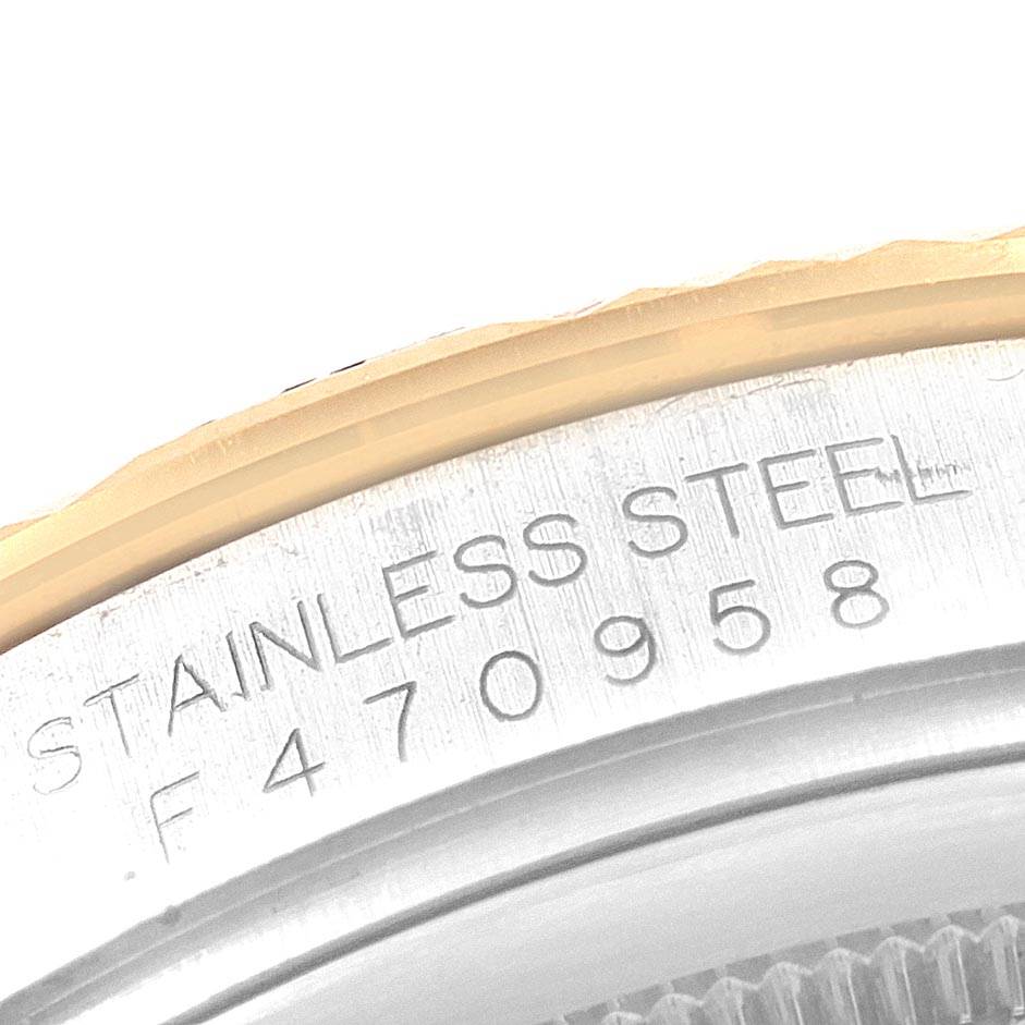 This close-up image shows the stainless steel case with serial number of the Rolex Turn-o-Graph 116263 Men
s Steel and Gold (two tone) White Dial 116263 Men
s Steel and Gold (two tone) White Dial watch.