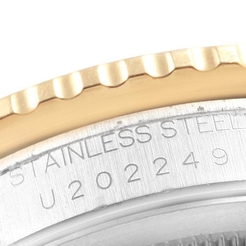 The image shows a close-up of the serial number and stainless steel inscription on the case back edge of the Rolex Turn-o-Graph 16263 Men
s Steel and Gold (two tone) White Dial 16263 Men
s Steel and Gold (two tone) White Dial watch.