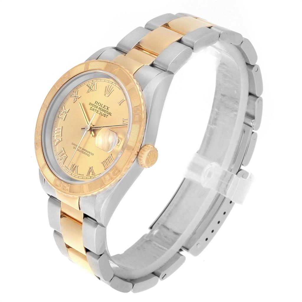 The image shows a Rolex Turn-o-Graph 16263 Men
s Steel and Gold (two tone) Champagne Dial 16263 Men
s Steel and Gold (two tone) Champagne Dial model watch at a three-quarter angle, highlighting its two-tone metal band, bezel, and dial.
