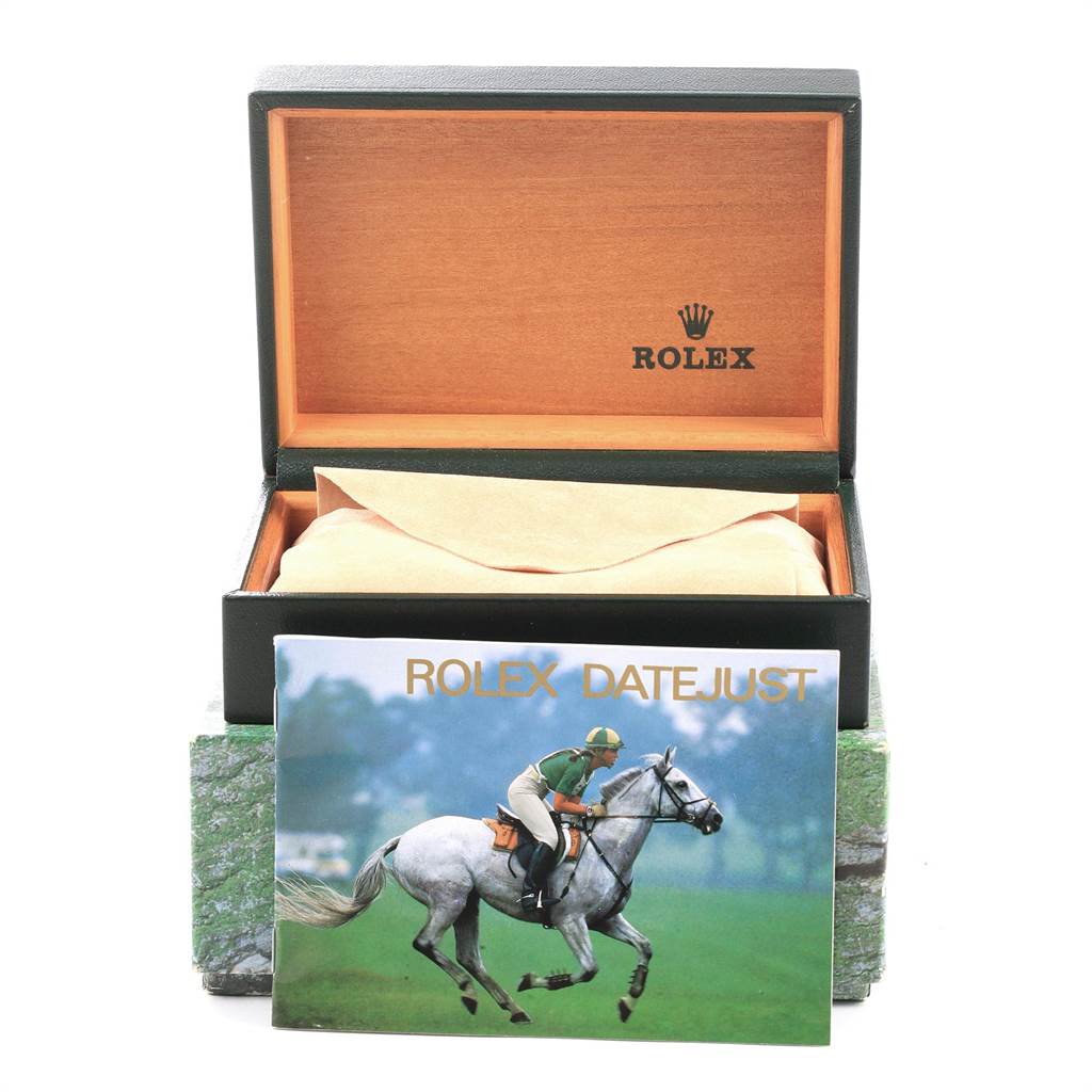 The image shows an open Rolex box without the Turn-o-Graph watch, accompanied by a Rolex Datejust booklet.
