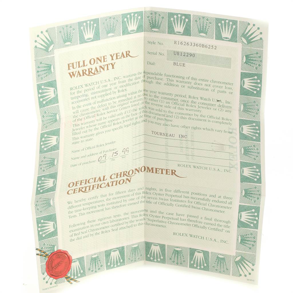 Shown is a certificate, including warranty and chronometer certification, for the Rolex Turn-o-Graph 16263 Men's Steel and Gold (two tone) Blue Dial 16263 Men's Steel and Gold (two tone) Blue Dial model.