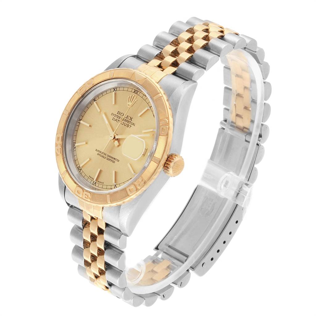 This image shows the Rolex Turn-o-Graph 16263 Men
s Steel and Gold (two tone) Champagne Dial 16263 Men
s Steel and Gold (two tone) Champagne Dial watch at a three-quarter angle, highlighting the face, bezel, crown, and two-tone bracelet.