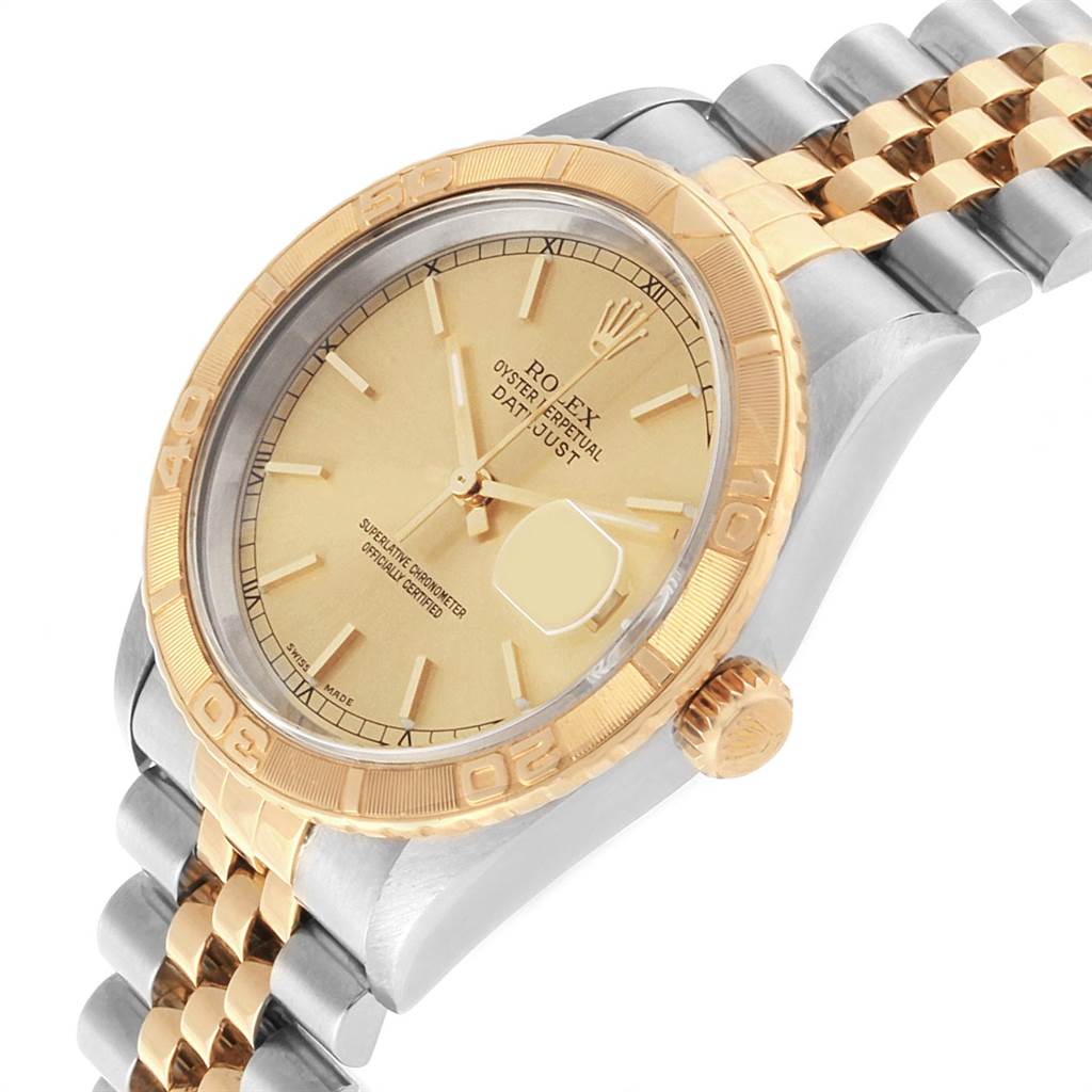 This image shows the Rolex Turn-o-Graph 16263 Men
s Steel and Gold (two tone) Champagne Dial 16263 Men
s Steel and Gold (two tone) Champagne Dial watch at a slight angle, highlighting the bezel, crown, dial, and part of the bracelet.