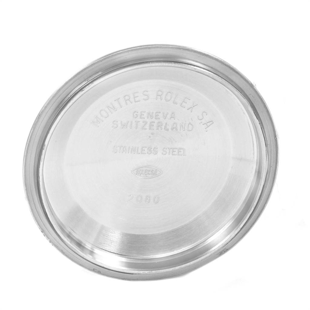 A close-up image shows the stainless steel case back of a Rolex Turn-o-Graph 16263 Men
s Steel and Gold (two tone) Champagne Dial 16263 Men
s Steel and Gold (two tone) Champagne Dial watch, engraved with brand details.