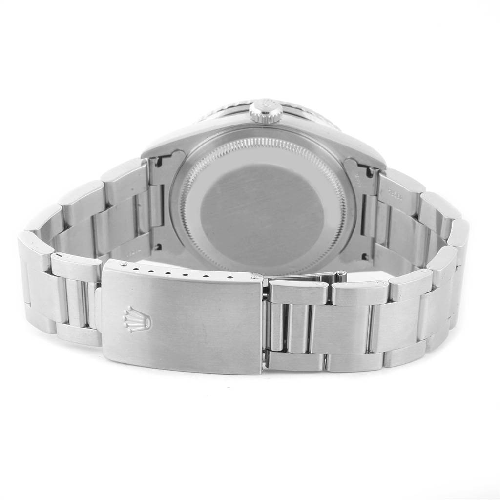 The image shows the back view of a Rolex Turn-o-Graph 16264 Men
s Stainless Steel Blue Dial 16264 Men
s Stainless Steel Blue Dial watch, highlighting its case back and bracelet clasp.