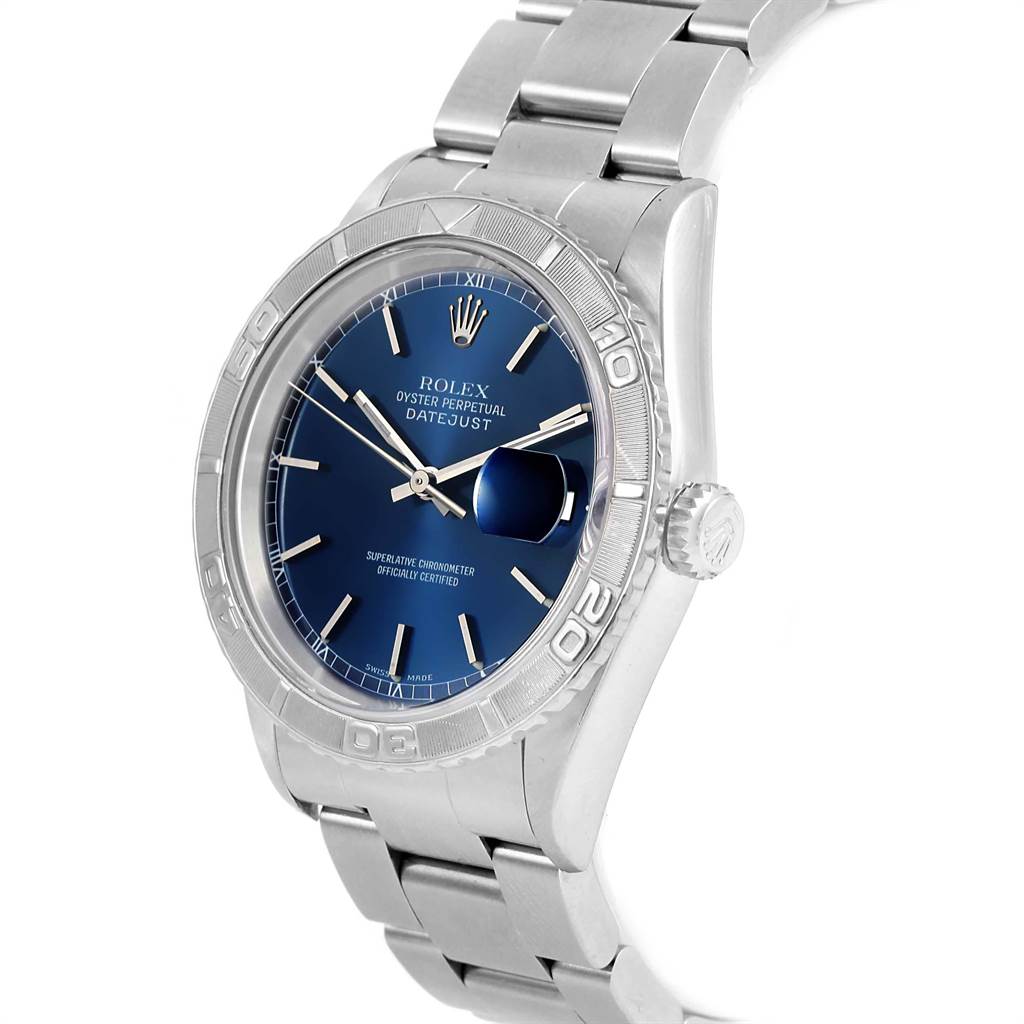The image shows a side-angle of the Rolex Turn-o-Graph 16264 Men
s Stainless Steel Blue Dial 16264 Men
s Stainless Steel Blue Dial Datejust, displaying the bezel, dial, crown, and bracelet.
