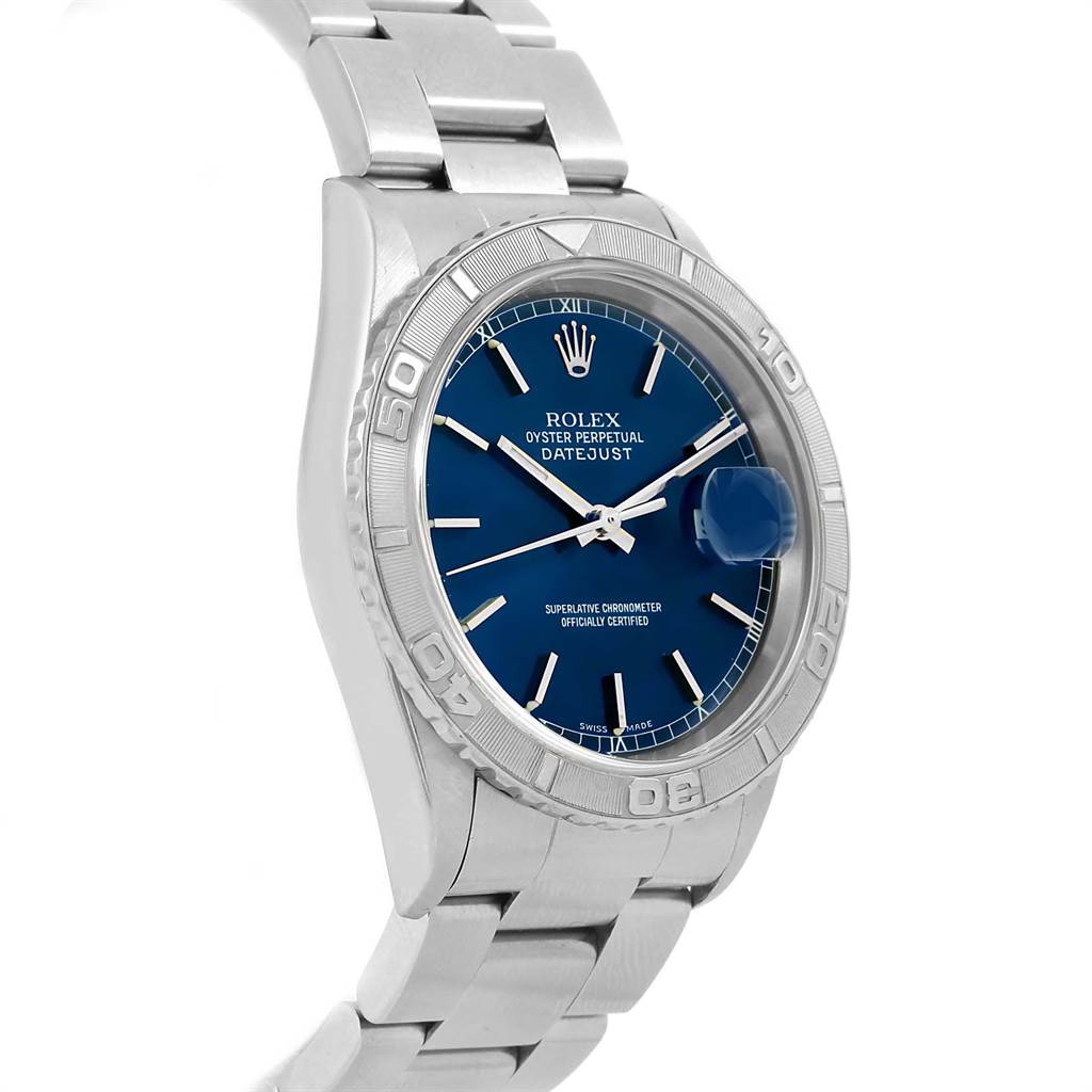The image shows a Rolex Turn-o-Graph 16264 Men
s Stainless Steel Blue Dial 16264 Men
s Stainless Steel Blue Dial watch from a front-side angle, highlighting the dial, bezel, and part of the bracelet.