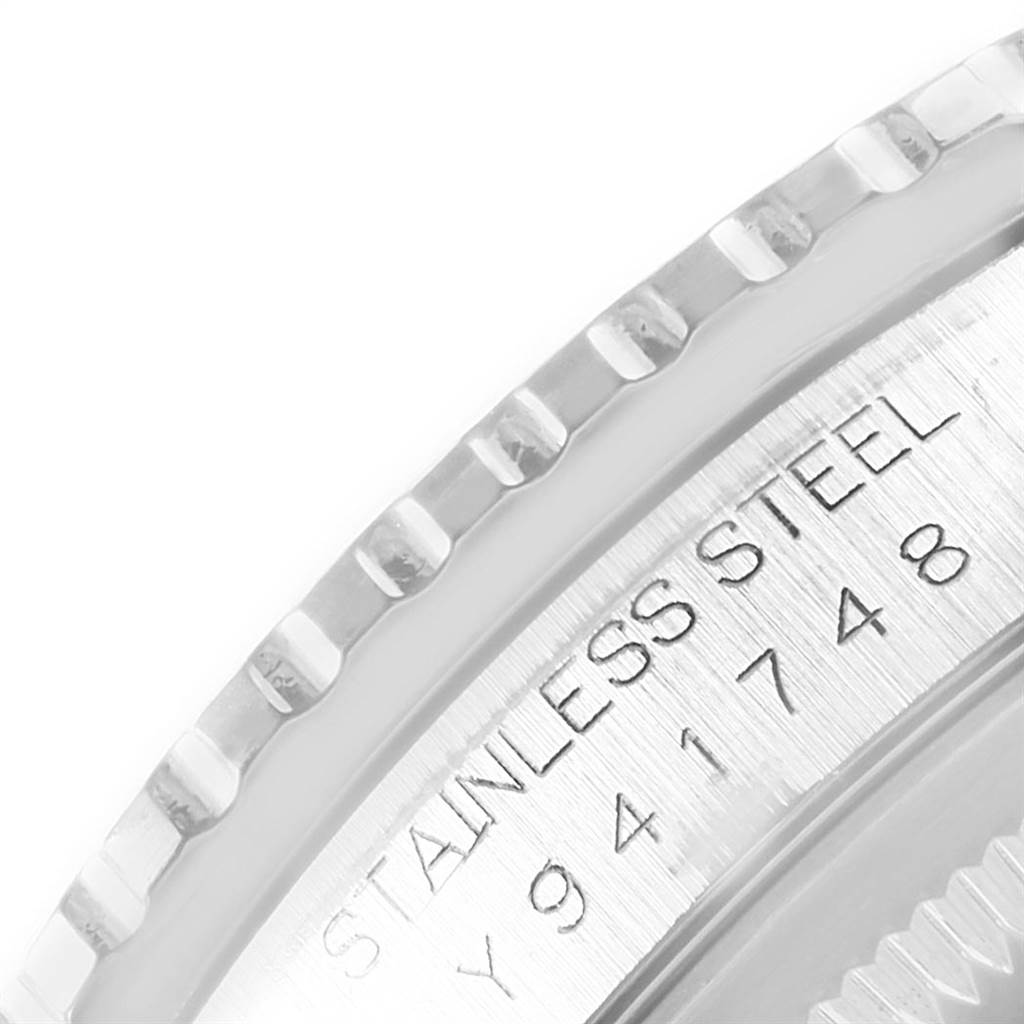 This image shows a close-up of the Rolex Turn-o-Graph 16264 Men
s Stainless Steel Blue Dial 16264 Men
s Stainless Steel Blue Dial
s stainless steel bezel and the engraved model number.