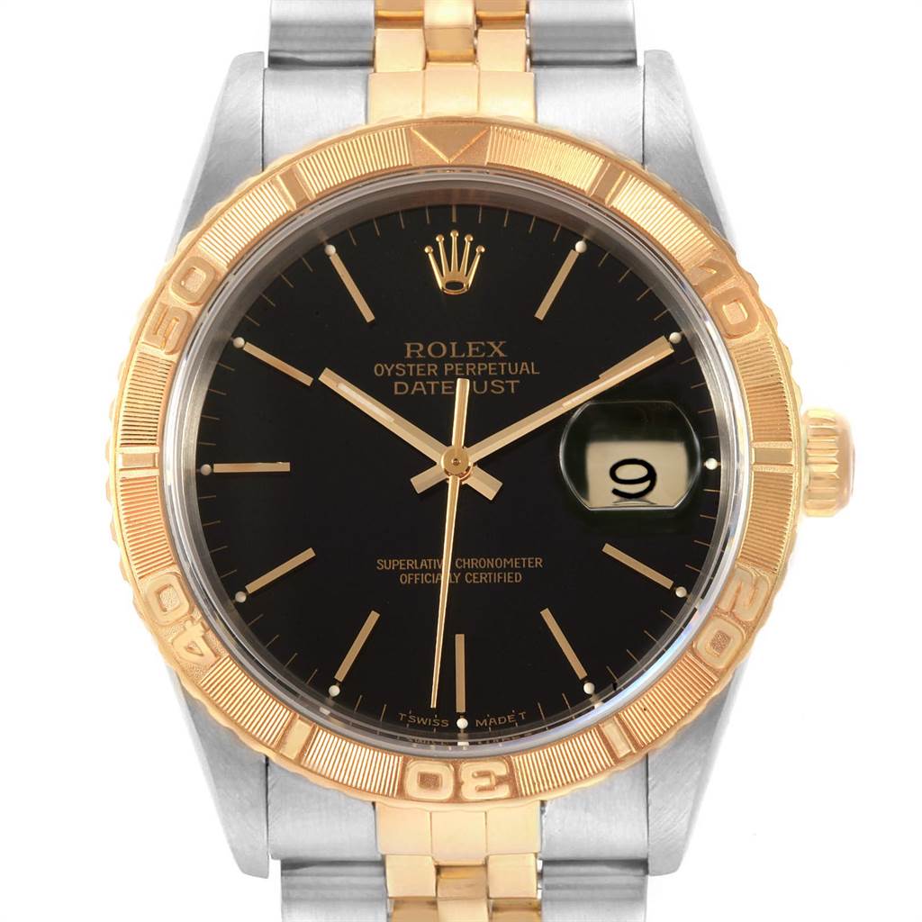 The Rolex Turn-o-Graph 16263 Men
s Steel and Gold (two tone) Black Dial 16263 Men
s Steel and Gold (two tone) Black Dial watch is shown from a front angle, displaying the black dial, gold bezel, and part of the two-tone band.