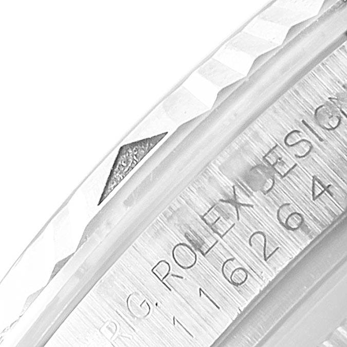 This is a close-up view of the bezel and part of the case back with the serial number inscribed on the Rolex Turn-o-Graph 116264 Men
s Stainless Steel Black Dial 116264 Men
s Stainless Steel Black Dial model.