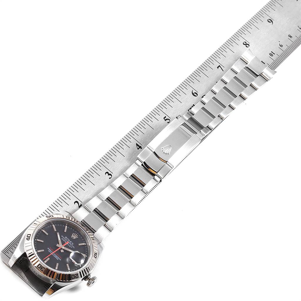 The image shows a Rolex Turn-o-Graph 116264 Men's Stainless Steel Black Dial 116264 Men's Stainless Steel Black Dial watch laid flat with its bracelet and clasp visible, alongside a ruler for measurement.