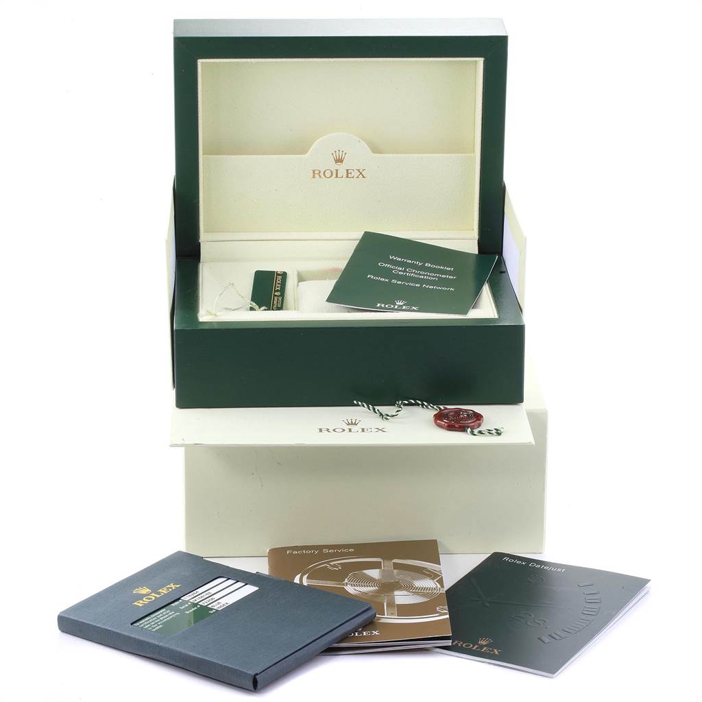 This image shows the packaging and documentation for a Rolex Turn-o-Graph 116264 Men
s Stainless Steel Blue Dial 116264 Men
s Stainless Steel Blue Dial, including the box, booklets, and tags.