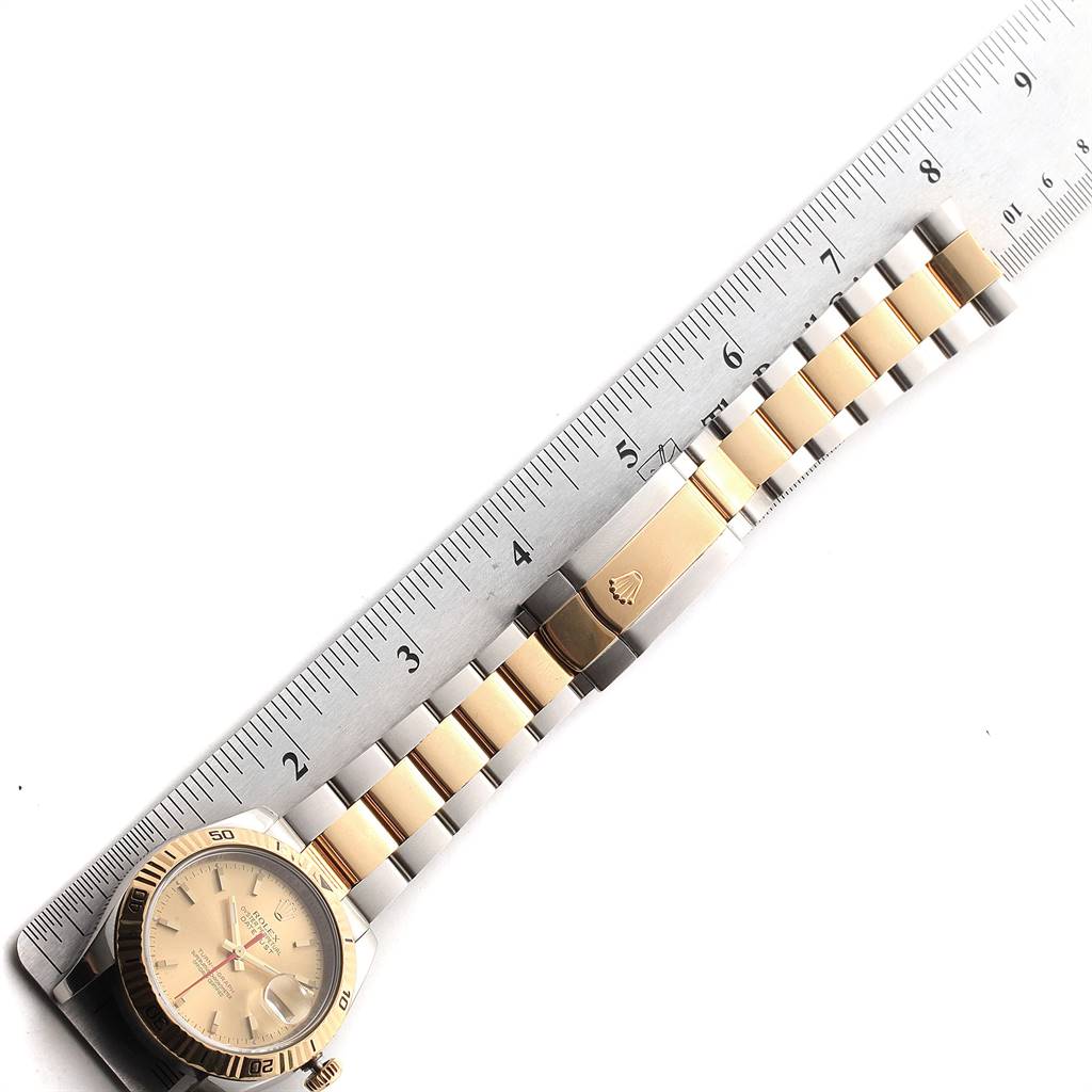 The image shows the face and bracelet of a Rolex Turn-o-Graph 116263 Men's Steel and Gold (two tone) Champagne Dial 116263 Men's Steel and Gold (two tone) Champagne Dial watch, measured against a ruler.