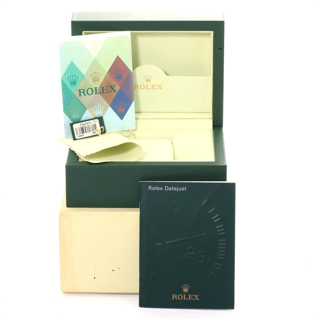 The image shows the open box and manual accessories for a Rolex Turn-o-Graph 116263 Men
s Stainless Steel White Dial 116263 Men
s Stainless Steel White Dial watch, including booklets and tags.