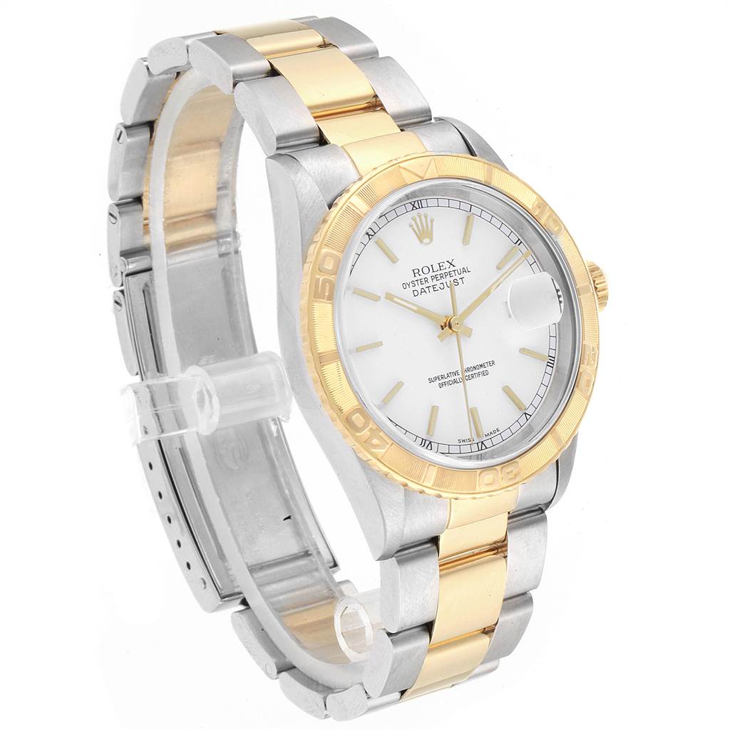 The Rolex Turn-o-Graph 16263 Men
s Steel and Gold (two tone) White Dial 16263 Men
s Steel and Gold (two tone) White Dial is shown at a slight angle, highlighting its gold bezel, white dial, date window, and two-tone metal bracelet.