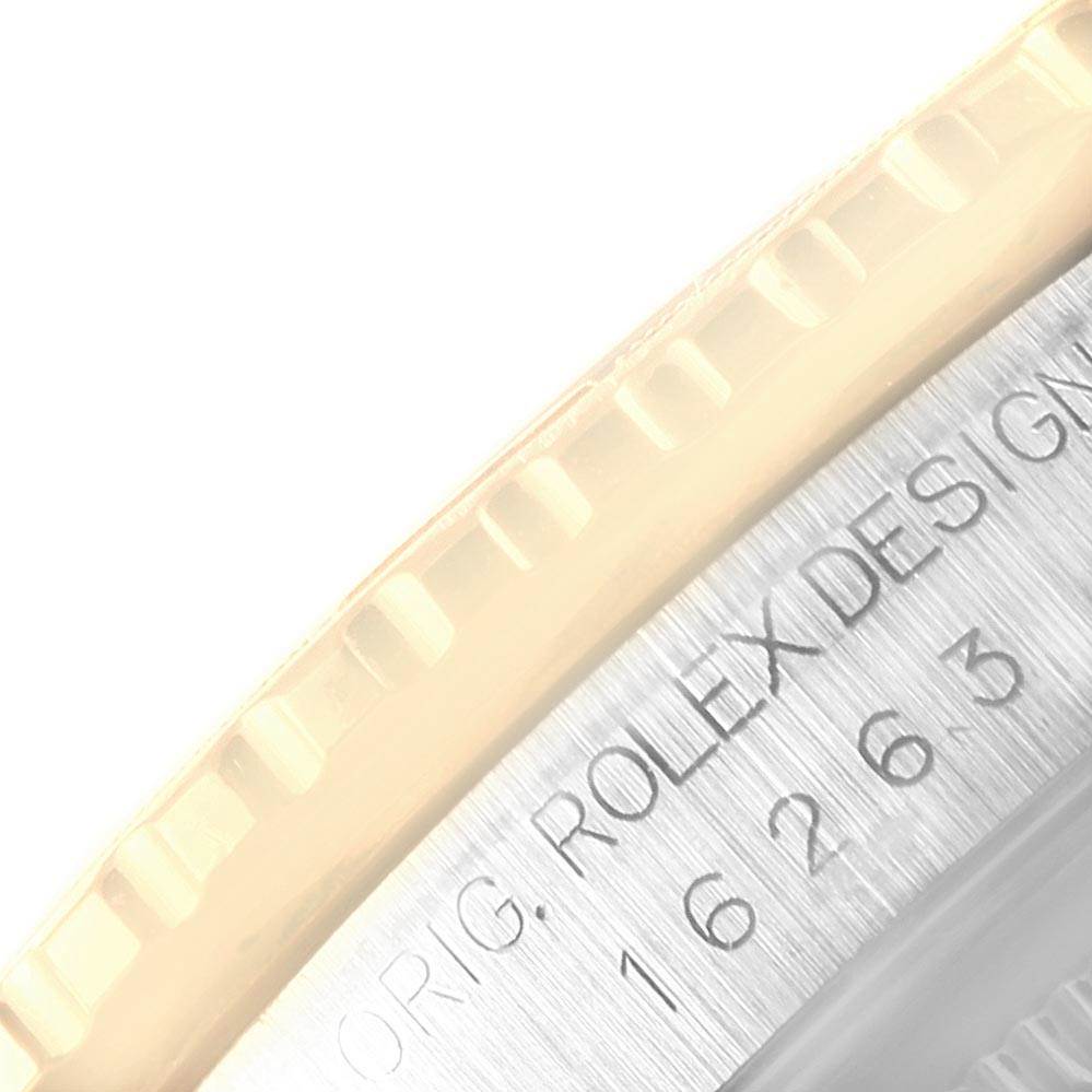 This close-up image shows the side of the bezel and part of the casing of a Rolex Turn-o-Graph 16263 Men
s Steel and Gold (two tone) White Dial 16263 Men
s Steel and Gold (two tone) White Dial watch.