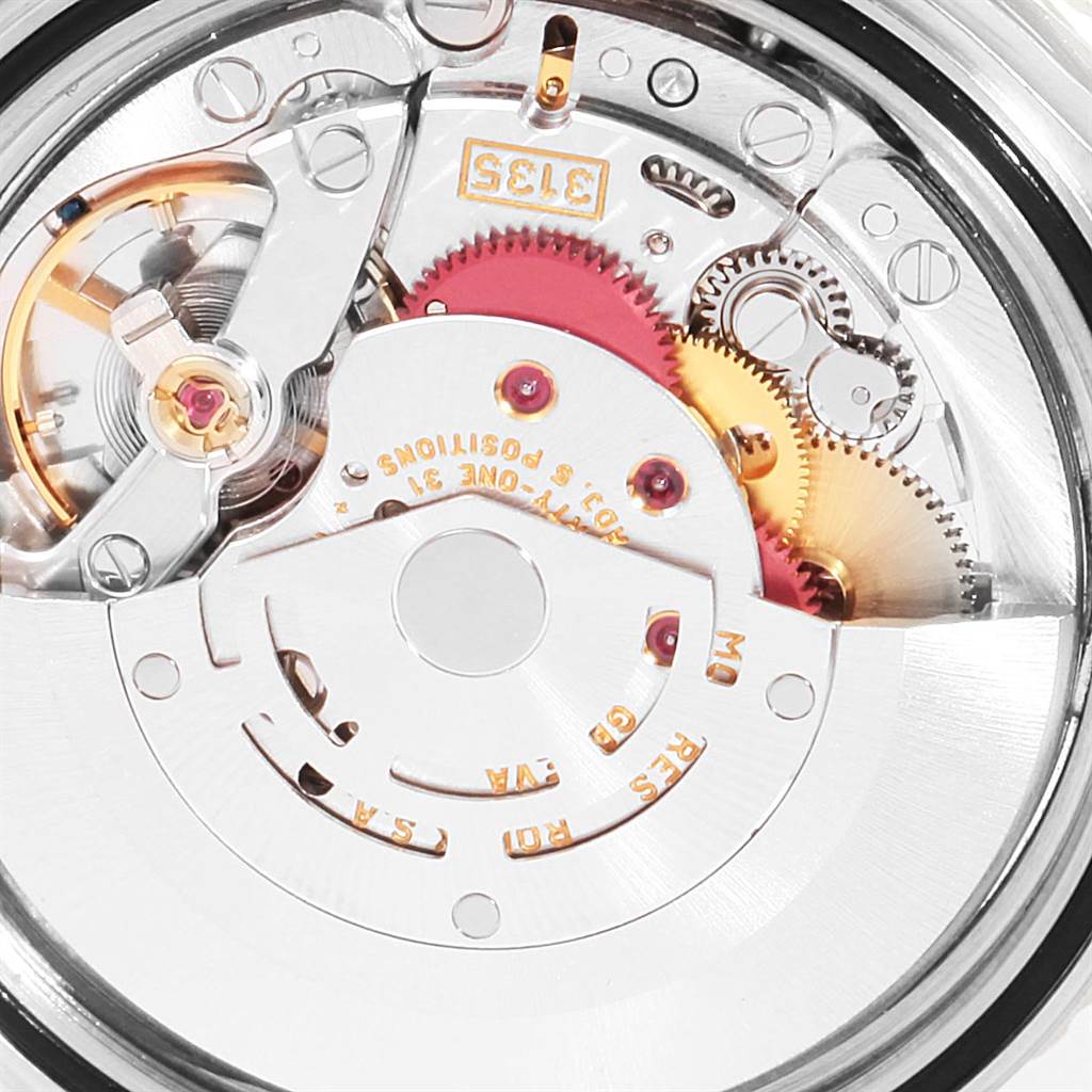 This image shows the intricate internal movement of a Rolex Turn-o-Graph 16263 Men
s Steel and Gold (two tone) White Dial 16263 Men
s Steel and Gold (two tone) White Dial watch from a close-up perspective.