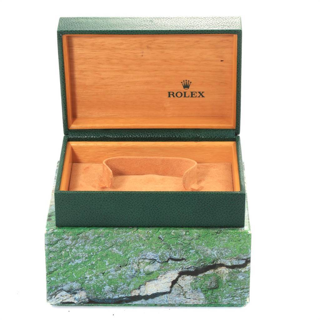 The image shows an open Rolex Turn-o-Graph 16263 Men
s Steel and Gold (two tone) White Dial 16263 Men
s Steel and Gold (two tone) White Dial watch box with a green exterior and wooden interior.