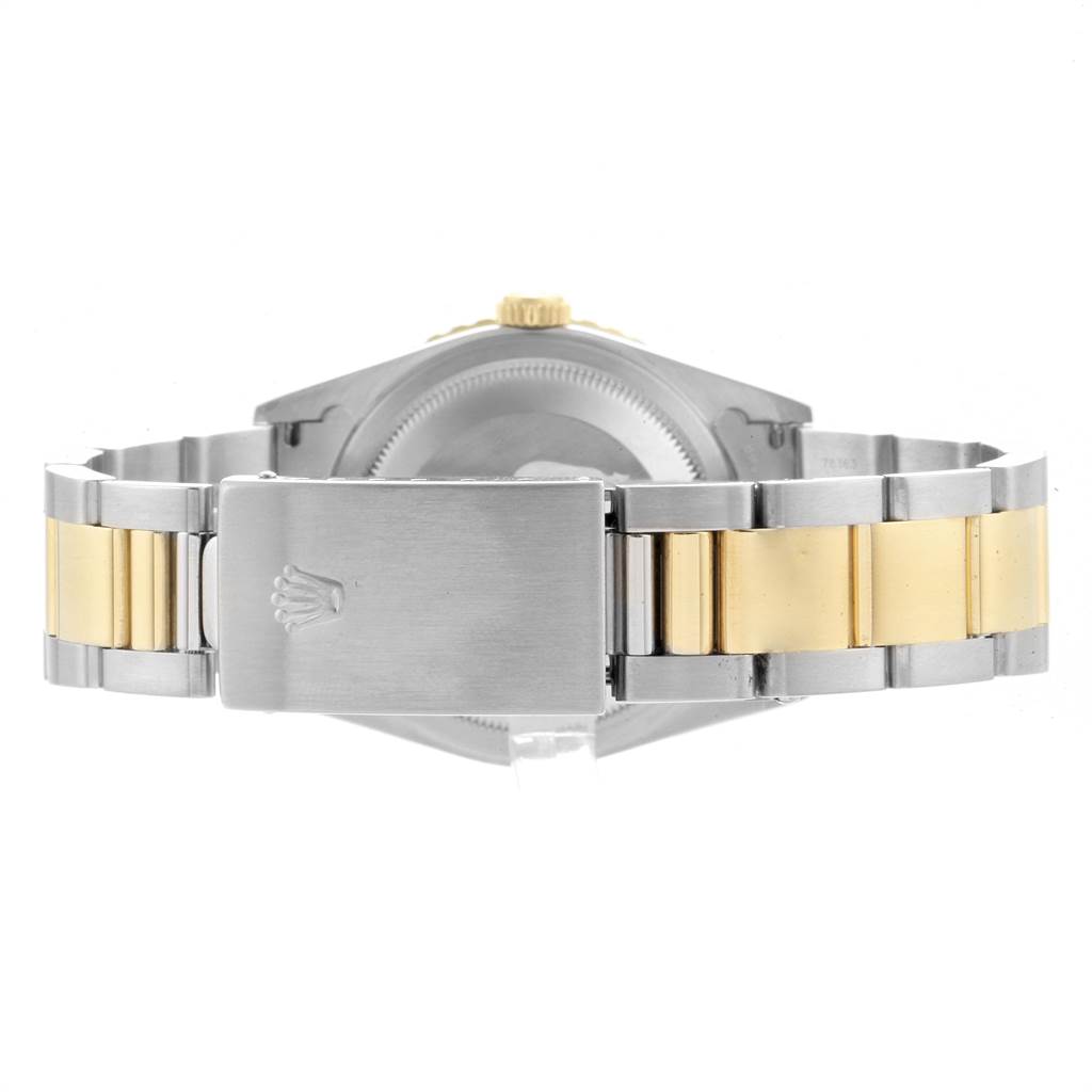 The image shows the back view of a Rolex Turn-o-Graph 16263 Men
s Steel and Gold (two tone) White Dial 16263 Men
s Steel and Gold (two tone) White Dial watch, highlighting the clasp and bracelet.