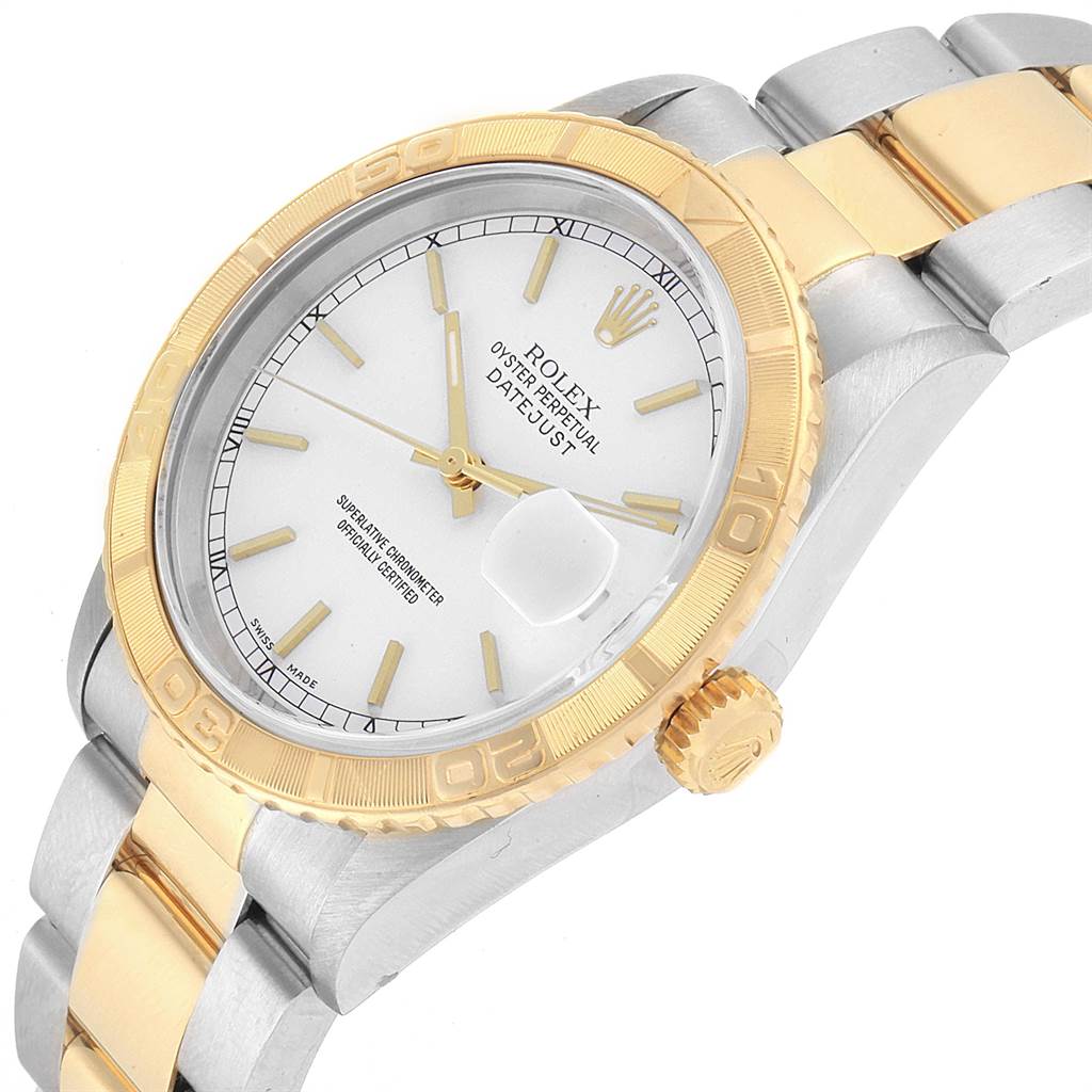 The image shows a side perspective of a Rolex Turn-o-Graph 16263 Men
s Steel and Gold (two tone) White Dial 16263 Men
s Steel and Gold (two tone) White Dial watch, displaying the face, bezel, crown, and part of the bracelet.