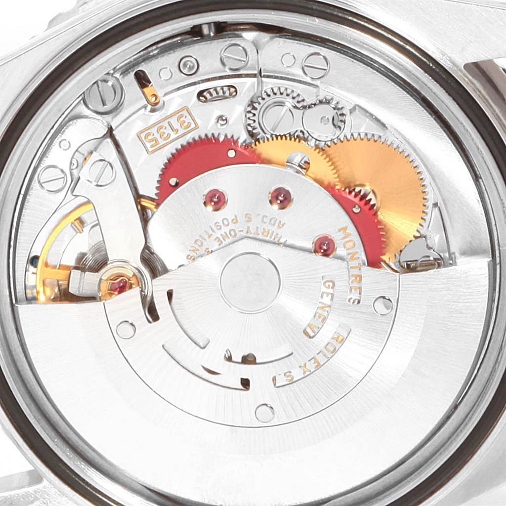 The image shows the intricate internal mechanism of a Rolex Turn-o-Graph 16264 Men
s Stainless Steel White Dial 16264 Men
s Stainless Steel White Dial watch from a close-up, rear view angle.