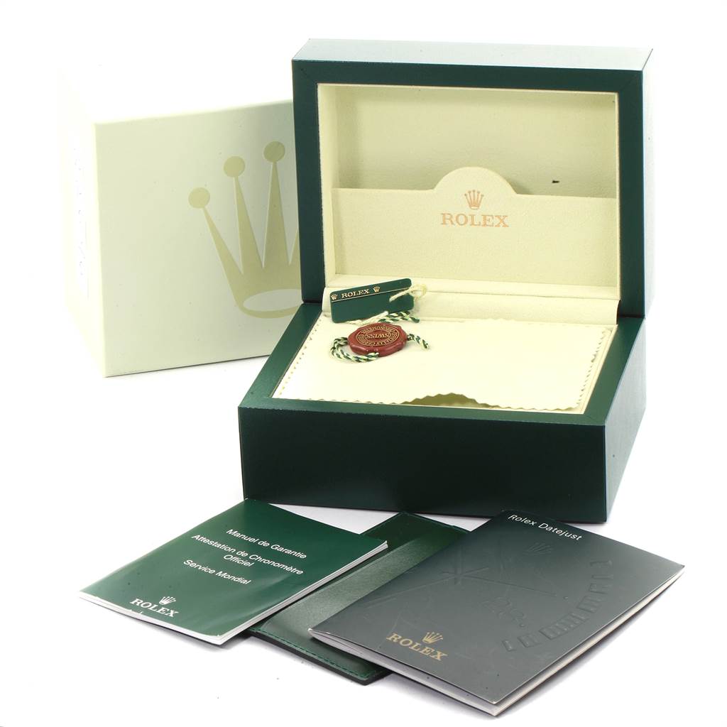 The image shows the packaging and accessories for a Rolex Turn-o-Graph 116264 Men
s Stainless Steel White Dial 116264 Men
s Stainless Steel White Dial, including its box, manuals, and tags.