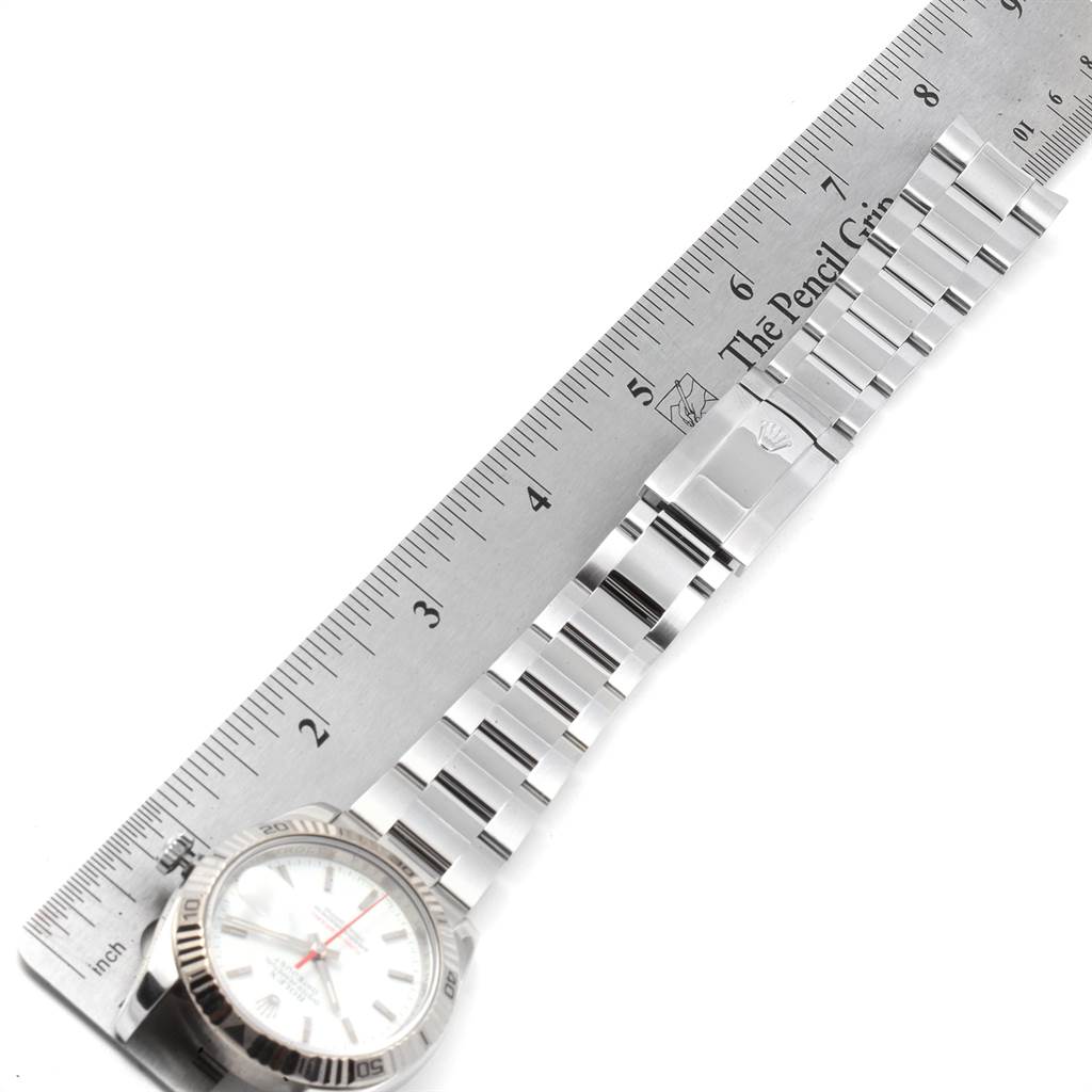 The image shows a Rolex Turn-o-Graph 116264 Men
s Stainless Steel White Dial 116264 Men
s Stainless Steel White Dial watch laid flat with the bracelet measured against a ruler.