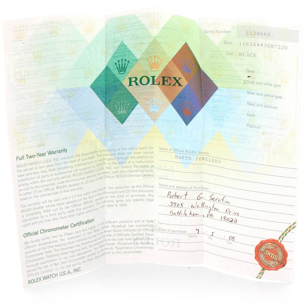 This image shows a warranty certificate and chronometer certification for the Rolex Turn-o-Graph 116264 Men
s Stainless Steel Black Dial 116264 Men
s Stainless Steel Black Dial model.