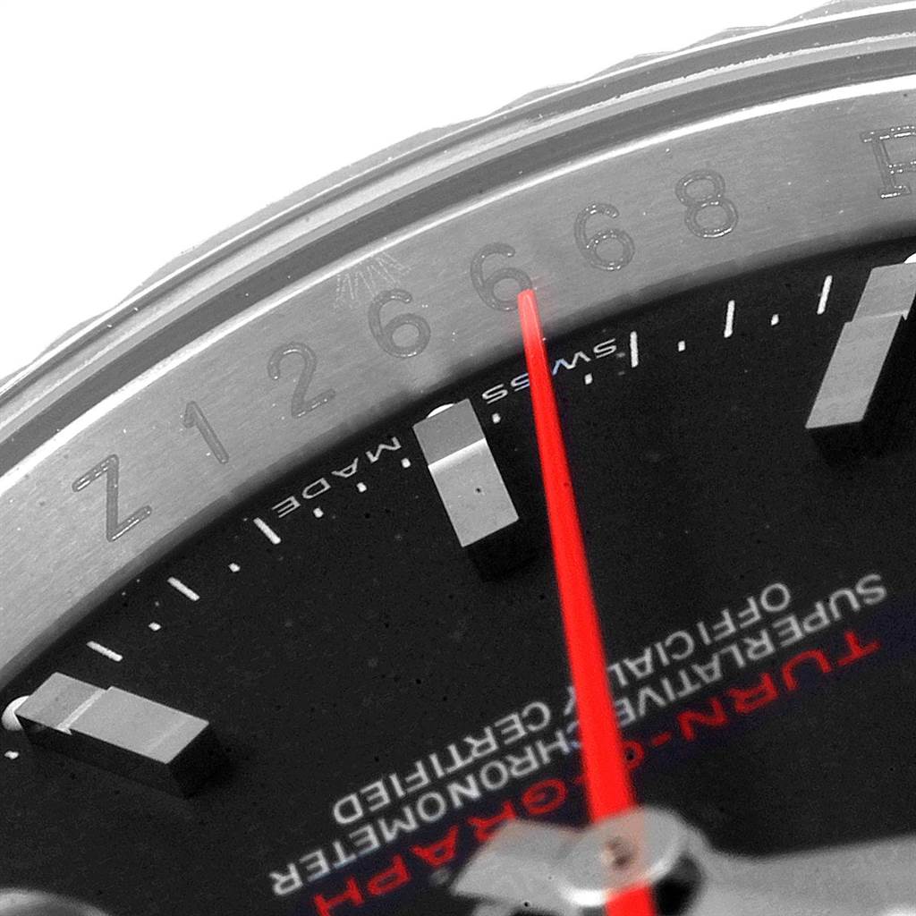 The image shows a close-up of the bezel, dial, and second hand of a Rolex Turn-o-Graph 116264 Men
s Stainless Steel Black Dial 116264 Men
s Stainless Steel Black Dial watch.