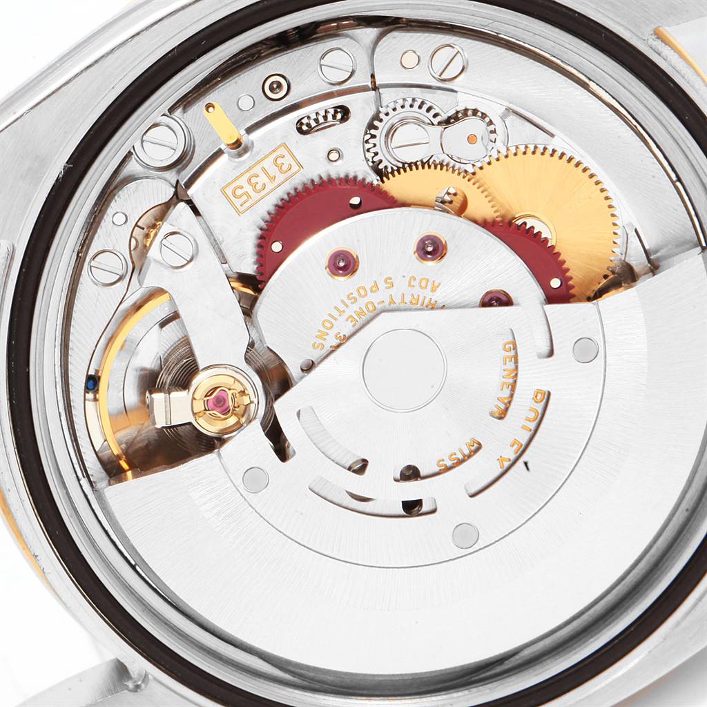 The image shows the intricate inner mechanism and components of a Rolex Turn-o-Graph 116263 Men's Steel and Gold (two tone) White Dial 116263 Men's Steel and Gold (two tone) White Dial watch from a close-up angle.