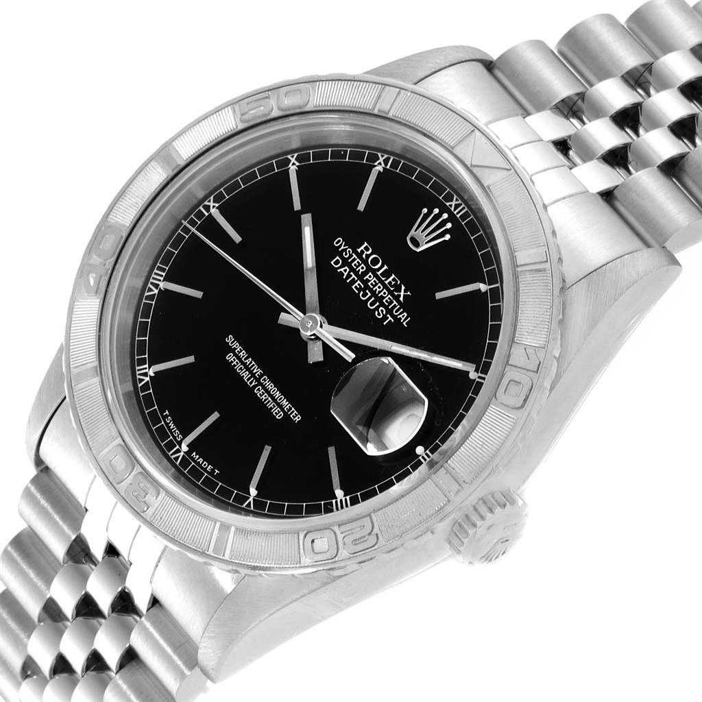 The image shows a Rolex Turn-o-Graph 16264 Men
s Stainless Steel Black Dial 16264 Men
s Stainless Steel Black Dial watch in a top-view angle, highlighting its black dial, date display, bezel, and metal band.