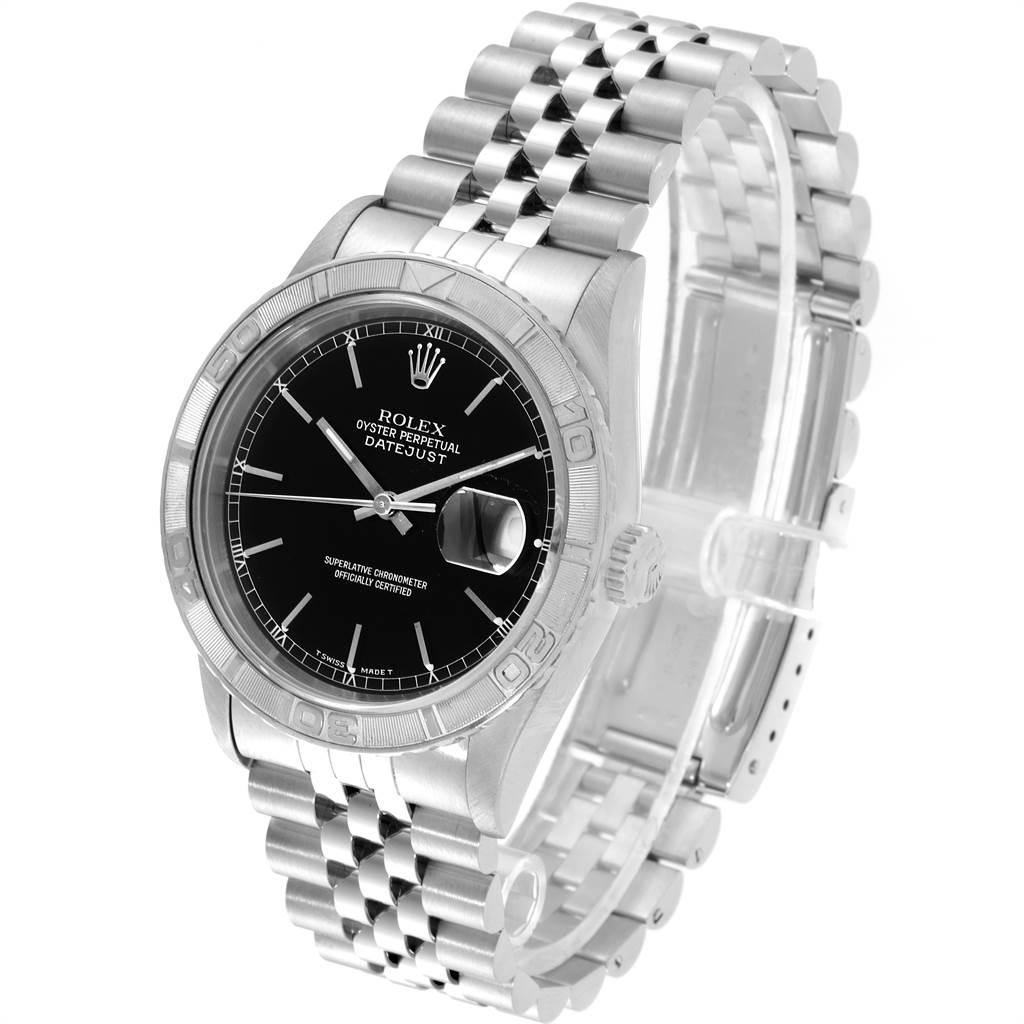 The image shows a Rolex Turn-o-Graph 16264 Men
s Stainless Steel Black Dial 16264 Men
s Stainless Steel Black Dial watch from a front-left angle, highlighting its black dial, bezel, and metal bracelet.