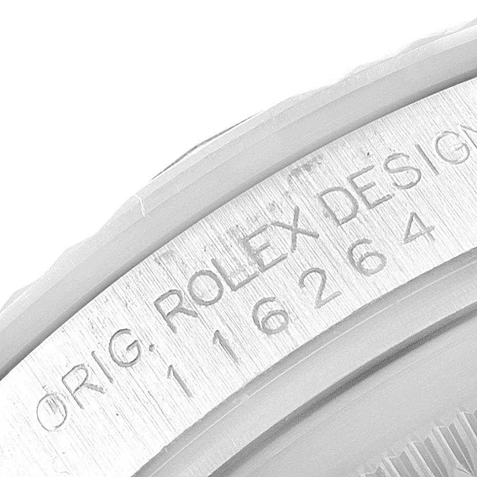 This image shows a close-up of the serial number engraved on the inner bezel of a Rolex Turn-o-Graph 116264 Men
s Stainless Steel White Dial 116264 Men
s Stainless Steel White Dial watch.