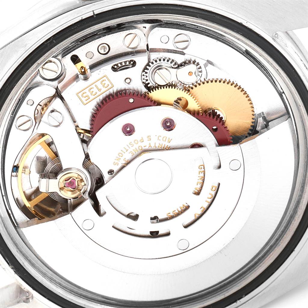 The image shows the internal mechanics and movement parts of a Rolex Turn-o-Graph 116264 Men
s Stainless Steel Black Dial 116264 Men
s Stainless Steel Black Dial watch from a back view angle.