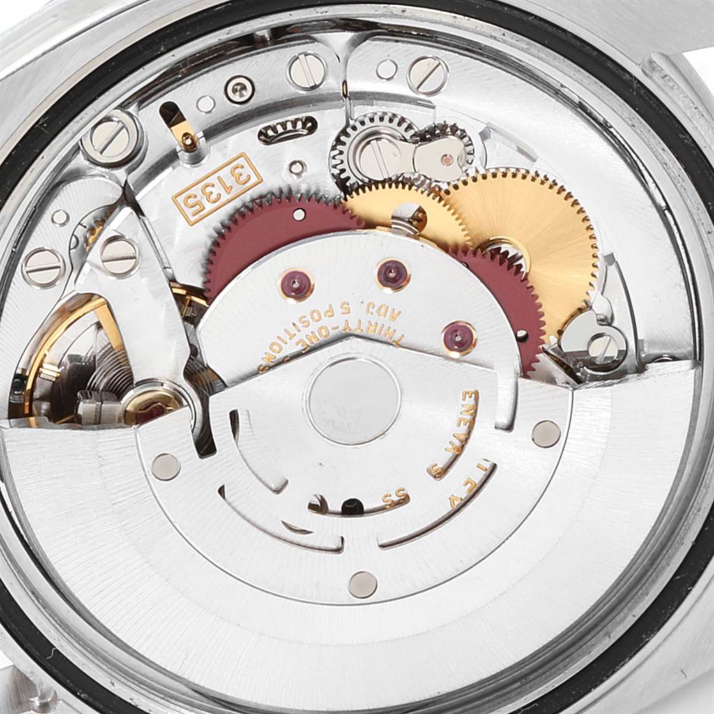 The image shows the internal mechanism and movement components of a Rolex Turn-o-Graph 116264 Men's Stainless Steel Blue Dial 116264 Men's Stainless Steel Blue Dial watch from a close-up angle.