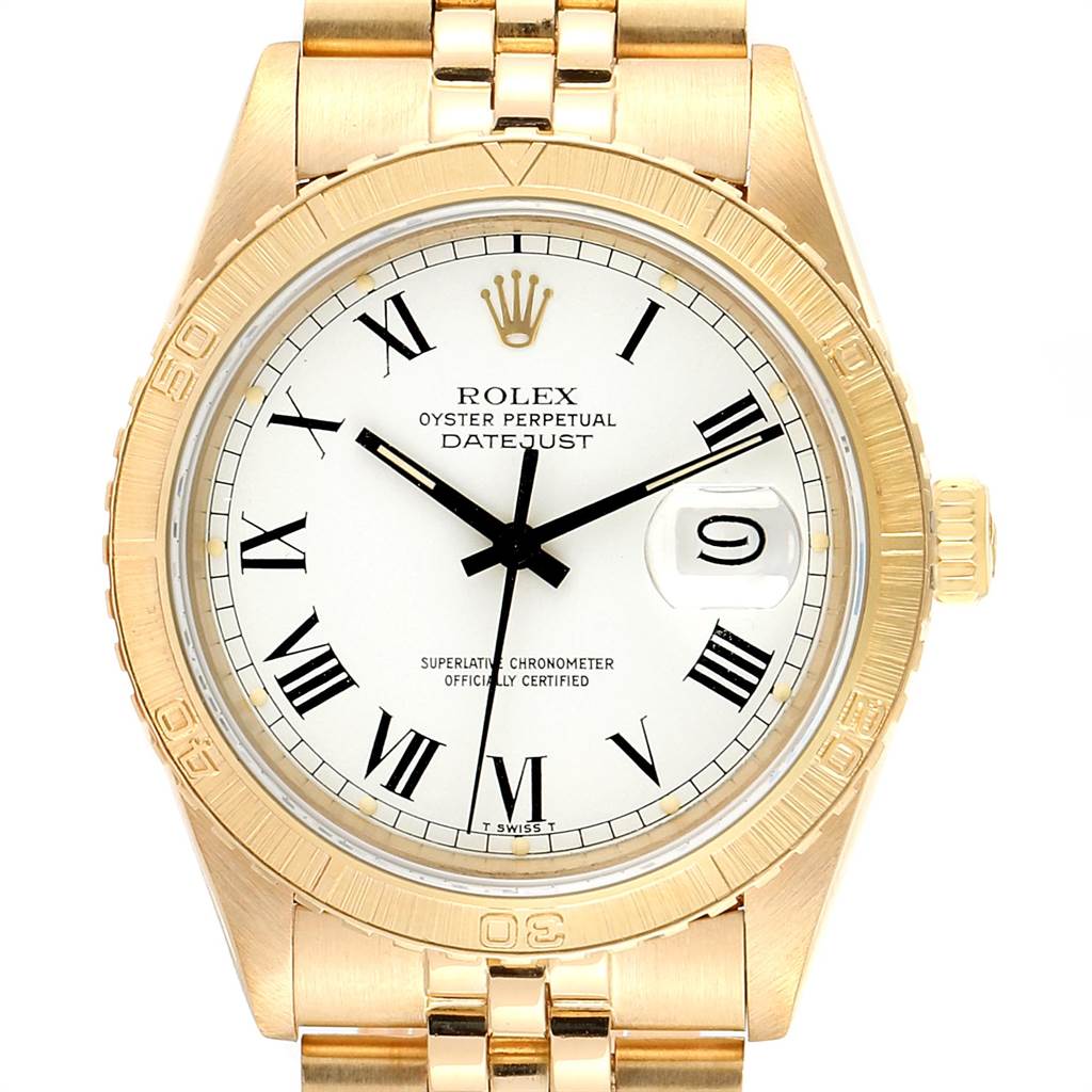 The image shows a front view of a Rolex Turn-o-Graph 16258 Men
s Yellow Gold White Dial 16258 Men
s Yellow Gold White Dial Oyster Perpetual Datejust watch with a gold case, bracelet, and white dial.